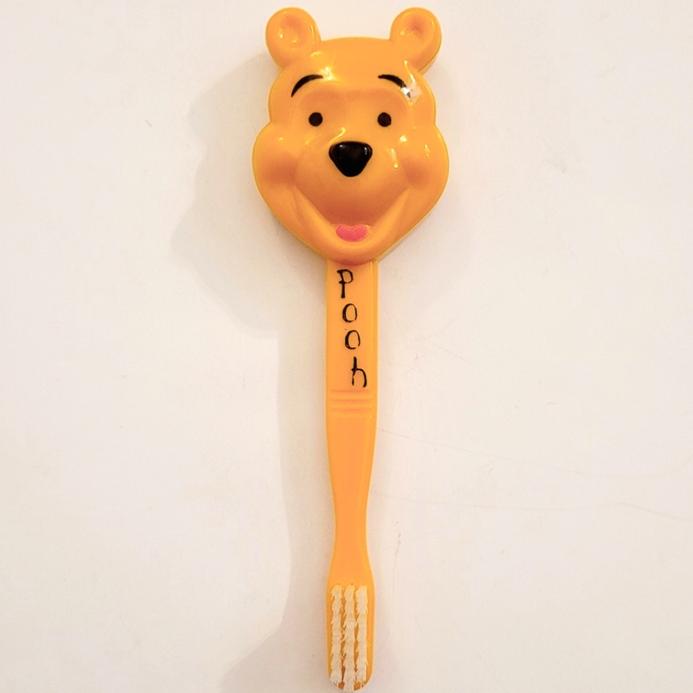 NWOT Winnie The Pooh mini Toothbrush